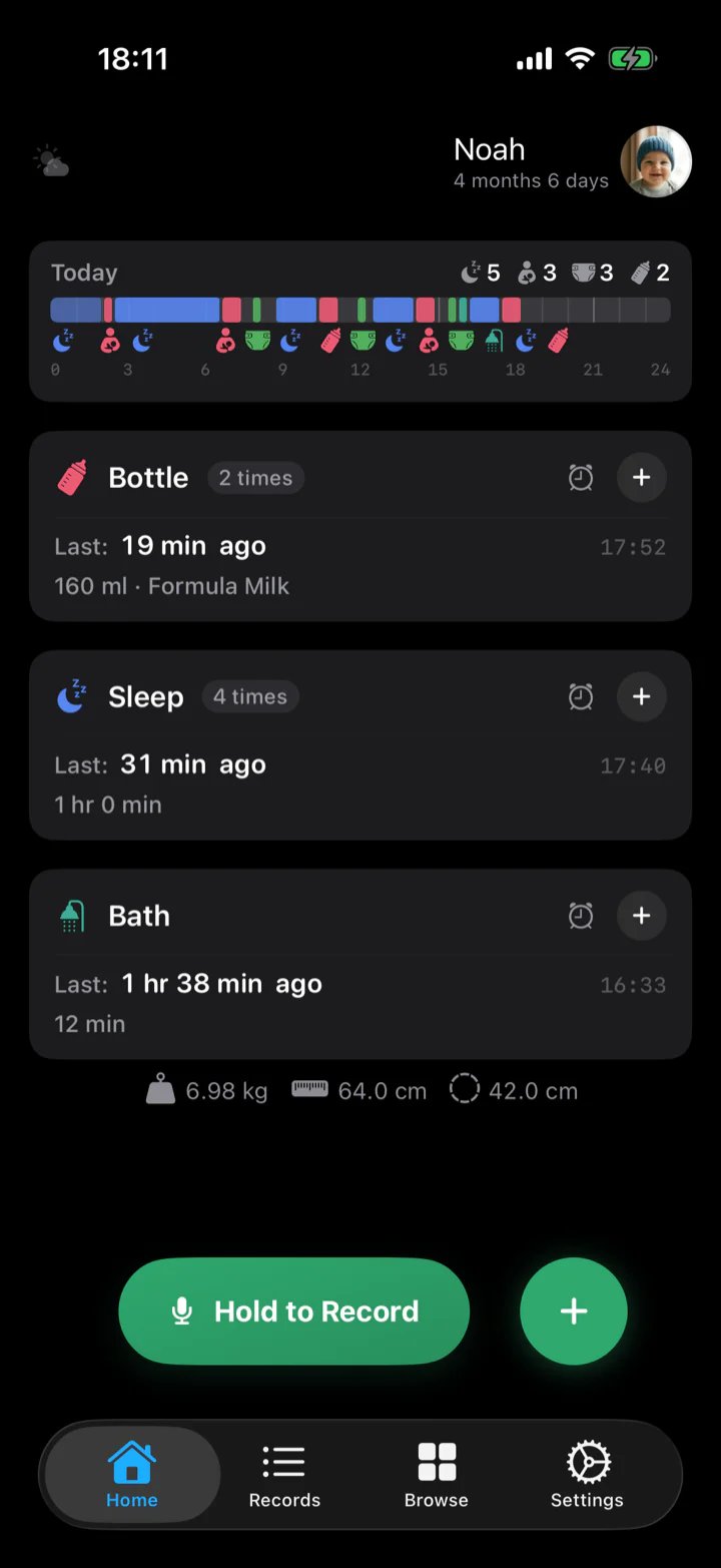 Baby Memos home screen at night: today's timeline, recent bottle, head circumference and weight, and a Hold to Record button