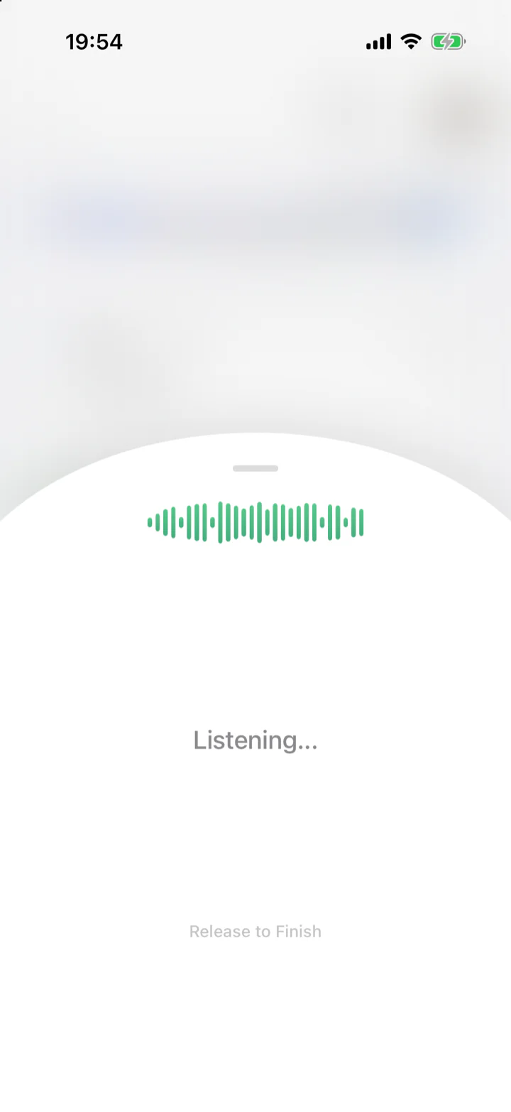Holding the record button: a waveform, “Listening…”, and “Release to Finish”